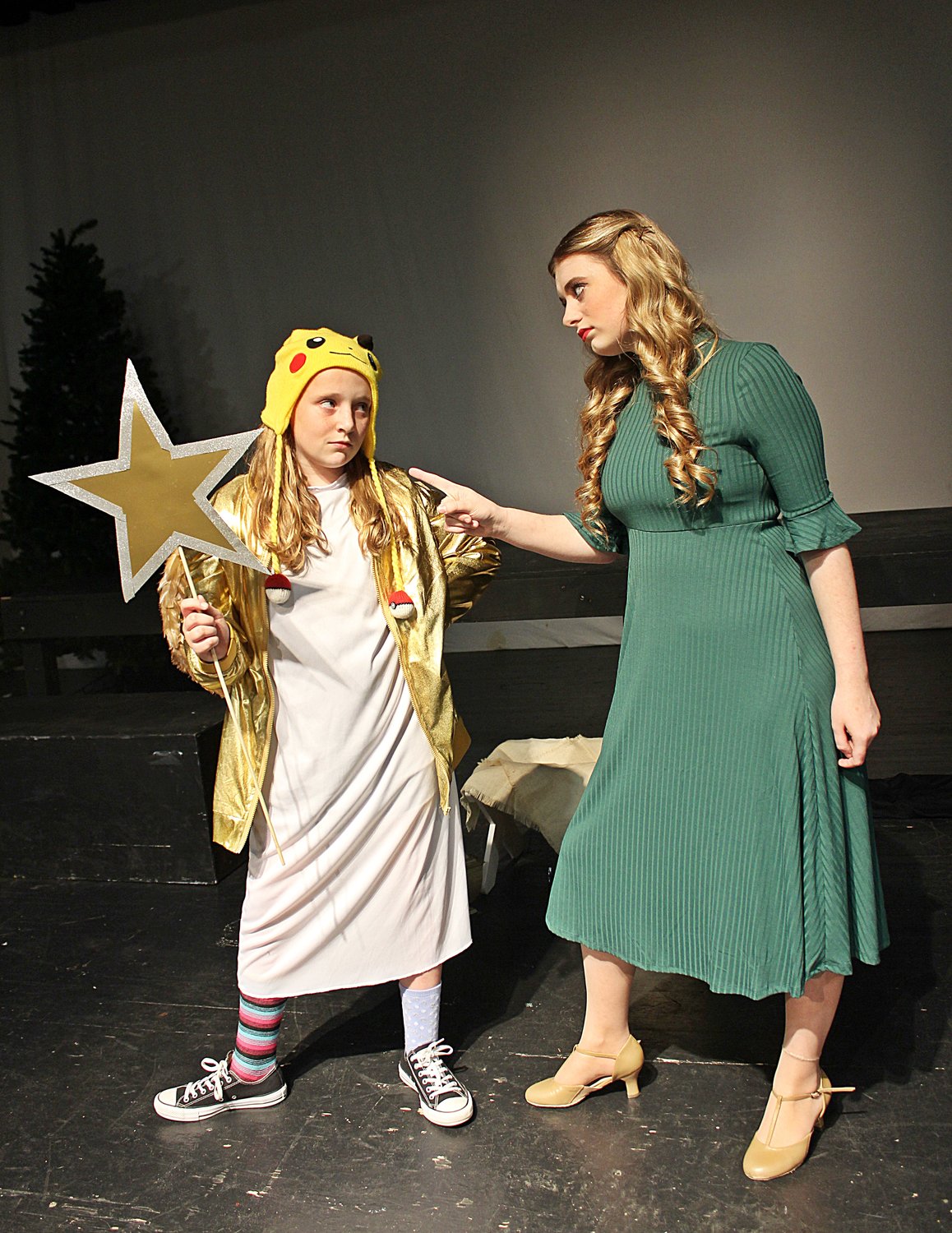 Gladys Herdman (Adelaide Kirk), left, is the meanest of the six Herman siblings that Grace Bradley (Katy Mayhan) has to deal with as director of “The Best Christmas Pageant Ever.”